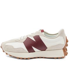 Find NEW BALANCE Ws327ka Sneakers on Editorialist. New Balance’s 327s are inspired by the brand’s ‘70s running sneakers and its archival 320, 355 and Supercomp designs. The 327s boldly reshape New Balance’s classic styles, featuring an angular silhouette, flared midsole and trail-inspired wraparound lug outsole. An oversized, asymmetrically applied ‘N’ logo completes the look. Suede and Nylon Uppers, EVA Foam Cushioning, Flared Midsole, Rubber Heel Wrap, Rubber Lugged Outsole. New Balance Women' Burgundy Sneakers, N Logo, New Balance 327, Casual Sneakers Women, Yellow Cream, New Balance Sneakers, New Balance Women, Eva Foam, Sneaker Collection