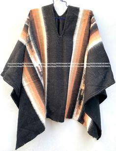 "EXPRESS SHIPPING! USA, CANADA, EUROPE AND AMERICA - 4 DAYS TO 8 DAYS MAXIMUM EXPRESS SHIPPING! ASIA, AFRICA AND OCEANIA - 4 DAYS TO 8 DAYS MAXIMUM Our traditional poncho has been made with the quality and rustic appereance of the natural Alpaca and designed in a very particular and nice style. Its an original versatile garment from the andes of Peru! MATERIAL: Alpaca Wool. Alpaca Wool is hypoallergenic, light and warm. Its fibers contain microscopic air bags that make the garments light and del Artisan Alpaca Poncho For Fall, Traditional Alpaca Poncho For Fall, Traditional Wool Poncho For Winter, Traditional Alpaca Cape For Winter, Traditional Alpaca Winter Cape, Peru Poncho, Poncho For Men, Peruvian Poncho, Poncho Winter