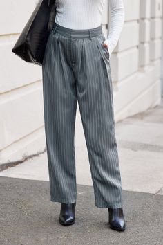 Step up your style with the Grey Pin-Striped Straight Leg Pants. These pants offer a sleek, professional look with their classic pin-stripe pattern and straight-leg fit. Perfect for the office or any occasion where you want to make a polished impression. Product code: CAA02D4G029SS Features:  Woven Straight leg Pattern: Stripes Wash Method: Regular Wash Material: 100%POLYESTER. Pinstripe Straight Pants For Business Casual, Elegant Striped Office Pants, Formal Pinstripe Ankle-length Pants, Elegant Striped Pants For Office, Striped Tapered Leg Dress Pants For Business Casual, Elegant Pinstripe Tapered Leg Pants, Elegant Pinstripe Bottoms For Workwear, Elegant Pinstripe Bottoms For Work, Elegant Pinstripe Ankle-length Bottoms