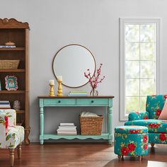 a living room filled with furniture and a mirror