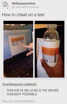 there is a bottle that has been placed in front of a computer screen and on top of the laptop