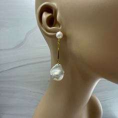 NEW Signature Series Collection This is custom order. This handmade Mismatched Baroque double Pearl design earrings with tiny pearl button stud is unique! The size and shape of the baroque Pearls are different and the one pearl is with a long gold bar drop. Pls see model wearing a similar style, last photo for reference. This is also available in matched pair size of baroque; and/or matched with both gold long bars with dangling baroque pearls. Pls select. The Baroque or flameball cultured fresh Elegant Long Drop Baroque Pearl Earrings, Baroque Pearl Earrings With Pearl Pendant For Party, Party Pearl Earrings With Baroque Pearl Pendant, Party Baroque Pearl Earrings With Pearl Pendant, Luxury Baroque Pearl Drop Earrings, Teardrop Baroque Pearl Earrings For Party, Baroque Pearl Drop Earrings For Evening, Evening Baroque Pearl Drop Earrings, Baroque Pearl Long Drop Earrings