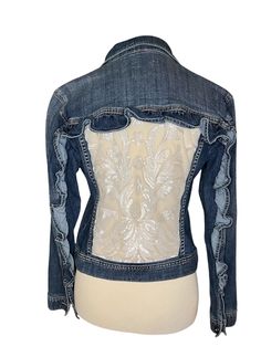 One of a kind! Upcycled denim jacket made of a reclaimed jean jacket and inset with a panel of sheer, sequined wedding dress material. Accented with denim ruffles across the back and down the sleeves. Women's size small (please see measurements). Note: denim edges will fray with wear and adds to the design of the jacket. For the woman who wants to stand out from the crowd.  Perfect to cap off a bachelorette outfit or wear on your honeymoon. Would also be perfect to wear to a music festival.  Length 20.5 inches Chest 18 inches (Measurements are taken with garment laying flat) Free shipping! Please reach out with any questions. Spring Recycled Denim Fitted Jacket, Spring Fitted Recycled Denim Jacket, Fitted Long Sleeve Denim Jacket In Recycled Denim, Fitted Medium Wash Denim Jacket For Festival, Fitted Bohemian Denim Blue Denim Jacket, Fitted Bohemian Denim Jacket In Blue, Bohemian Fitted Denim Blue Jacket, Fitted Denim Blue Denim Jacket For Festival, Fitted Embroidered Denim Jacket For Festival