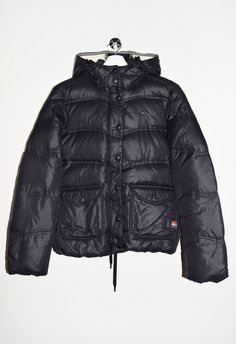 "Tommy Hilfiger Denim hooded puffer padded jacket in black. - Size tag: Please always check measurements before buying. Women's M - Measurements (laying flat): Pit to Pit: 21\" Length: 25.5\" Sleeve: 25.5\" Pit to Cuff: 19\" Across the shoulders: 17\" -Wear: /Please see images for details/ Overall in good vintage condition. Barely visible light scratches as shown on the pictures. - Fabric: 100% Nylon Filling: Down, Feathers *All of our items are preloved pieces so some signs of natural wear and age are to be expected. Please look through the photos carefully to check if the condition is to your satisfaction. *All efforts are made to show any defects however small imperfections may be missed. In cases that we've missed a major flaw, please remember that we are still human and make mistakes, Hooded Puffer Jacket, Visible Light, Padded Jacket, Puffer Jacket, Black Denim, Size Tag, Bulgaria, Feathers, Tommy Hilfiger