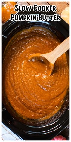 slow cooker pumpkin butter in a crock pot with the words slow cooker pumpkin butter