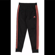 Adidas Tricot Jogger Pants Youth Girl's Black Warm-Up Sweatpants Size L (14). The Tricot Joggers By Adidas Ribbed Elastic Waistband Applied Dazzle 3-Stripes Down Side Seams Rib Cuffs On-Seam Pockets Embroidered Adidas Brandmark At Left Hip Measurements Approx Waist 25” Inseam 26” Adidas Bottoms, Black Adidas, Kids Bottoms, Jogger Pants, Black Pink, Sweatpants, Stripes, Adidas, Elastic