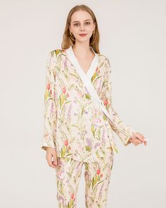 Type: Women's Silk Pajamas.Material:19 Momme 100% Luxury Mulberry Silk Details:Elevate your loungewear game with our luxurious silk pajama ensemble, designed to wrap you in elegance and coziness. 🌸 Floral Elegance: Adorned with a charming floral print, our pajama set adds a touch of timeless beauty to your relaxation routine. ✨ Pure Silk Bliss: Crafted from the finest silk, our pajamas offer an indulgent, smooth feel against your skin. Experience the ultimate in luxury and comfort. 🌙 Wrap-Styl Silk V-neck Sleepwear For Bedtime, Spring Satin Sets For Daywear, Long Sleeve Satin Sleepwear For Spring, Spring Bedtime Satin Sets, V-neck Spring Pajama Party Sets, Elegant Bedtime Sets For Spring, Spring Silk Sleepwear, Silk Sleepwear For Spring Season, White Silk Long-sleeve Sleepwear