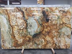 a large marble slab sitting on top of a metal stand