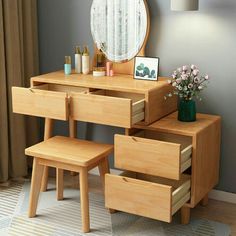 a wooden vanity with drawers and stools in front of a mirror on the wall