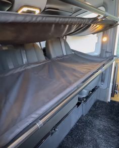 the interior of an rv with bunk beds and no mattresses on it's sides