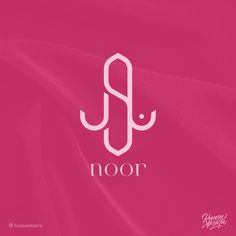 a pink background with the letter j and an image of a hook on it's side