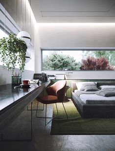 black and white photograph of a living room with couches, coffee table and large window