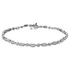 Excellent condition. Tiffany Co Jazz Diamond Platinum Bracelet. 1.60 Ct in total Length: 7 inch Width: 3 mm Weight: 11 gram White Round Brilliant Diamonds Color: F Comes with original Tiffany Box Bracelets Tiffany, Tiffany And Co Bracelet, Tiffany And Co Jewelry, Tiffany Box, Platinum Bracelet, Bracelet Tennis, Modern Bracelets, Tiffany Jewelry, White Bracelets