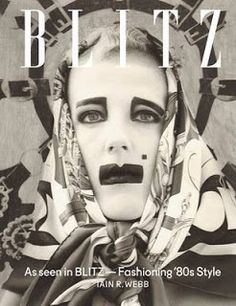 a magazine cover with an image of a woman's face painted in black and white