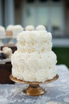 a white cake sitting on top of a table