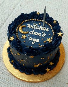 a birthday cake with the words witches don't age written on it and stars