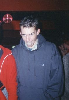 two young men standing next to each other