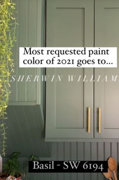 a kitchen with green cabinets and wooden utensils in the cabinet doors, which are labeled most requesting paint color of 2012 goes to