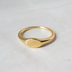 Dainty signet ring that is great for stacking or for a minimalist look!  - - - D E T A I L S - - - * Made of 925 Sterling Silver * THICK plating of 14k Gold or Rhodium * Available in sizes 4-12 * Nickel-free & Hypoallergenic  Comes in a cute box, ready for gift-giving! Made with 100% Pure Love! ♡ Happy to answer any questions you may have! 🥰 Let's Connect! 🥰 IG: samijewels_ Dainty Oval Stackable Signet Ring, Dainty Stackable Signet Ring With Round Band, Dainty Stackable Open Signet Ring, Dainty Initial Ring With Polished Finish, Minimalist Initial Promise Ring, Adjustable Dainty Signet Ring, Simple Tarnish Resistant Midi Rings For Everyday, Simple Tarnish-resistant Midi Rings For Everyday, Simple Everyday Tarnish Resistant Midi Rings