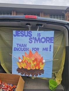 a sign on the back of a car that says jesus is smore than enough for me