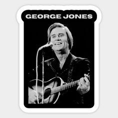 george jones singing into a microphone and holding a guitar in front of a microphone with the words george jones on it