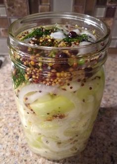 a jar filled with food sitting on top of a counter