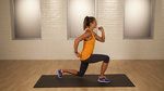 a woman is running on a yoga mat