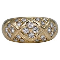 It is a modern design band ring crafted in 18K yellow gold. Circa 1980. The piece features 24 round brilliant cut diamonds: TW 0.65ct, RW-W, VS-SI. Weight: 9.03g Size: 16.5 (US 6) IMPORTANT: please ask about the possibility to resize before purchase. This process takes 2-7 days depending on the complexity. ——— If you have any questions, please feel free to ask. We describe our items accurately. Please note that in reality they can look much better because photo can’t capture that magical sparkle. We have many years of experience in this business. And we have a very carefully curated selection of pieces. You can buy with confidence. Thank you for your consideration. ——— "Laura Antiques Fine Jewellery” is a successful family-owned business since 2009. Our enthusiasm for finding fine jeweller Diamond Band Ring, David Webb, Diamond Brooch, Ring Crafts, Diamond Rings Bands, Christian Lacroix, Diamond Band, Rose Cut Diamond, Antique Jewellery