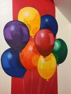 a painting of balloons on a red and white wall with the colors of the rainbow