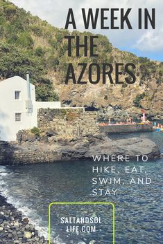 a white house sitting on top of a rocky cliff next to the ocean with text overlay that reads, a week in the azures where to hike, eat and stay