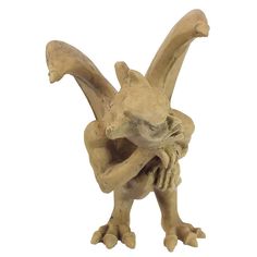 a ceramic figurine of a creature holding its head in his hands, on a white background