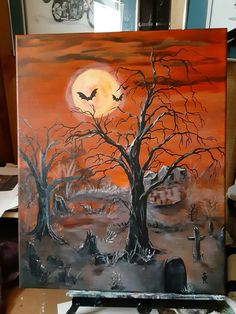 an acrylic painting of a spooky tree with bats