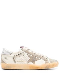 off-white/taupe/silver-tone calf leather silver-tone stud detailing signature star patch to the sides distressed effect round toe front lace-up fastening logo patch at the tongue contrasting branded heel counter flat rubber sole Tone Calves, Goose Sneakers, Golden Goose Sneakers, Golden Goose Deluxe Brand, Super Star, Van Cleef Arpels, Leather Silver, Golden Goose, Lady Dior