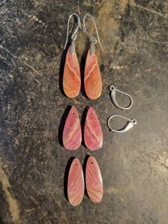 "These are pairs of handmade pink Rhodochrosite drop earrings. The colors include shades of strawberry -rose-pink with hints of peachy-amber. The drop from earlobe is 1 1/2\". Both fishhooks and leverbacks are available." Pink Teardrop Earrings With Natural Stones, Chandbalis Earrings, Strawberry Rose, Strawberry Roses, Pink Rhodochrosite, Fish Hook, Rose Pink, Teardrop Earrings, Pink Roses