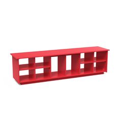 a red shelf sitting on top of a white wall