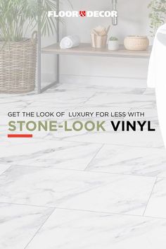 a bathroom with white marble floors and tile flooring that looks like stone - look vinyl