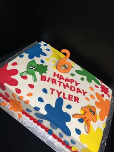 a birthday cake with an animal theme on the top and number 2 on the bottom