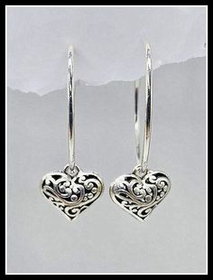 valentines earrings silver, heart earrings silver, filigree heart earrings, heart hoop earrings, boho heart earrings.  Set includes 1 pair of snapback hoops plus filgree hearts.  choice which size hoops you prefer: small or medium hoop. Cheap Silver Heart-shaped Hoop Earrings, Nickel-free Silver Heart Hoop Earrings, Heart-shaped Sterling Silver Hoop Earrings, Handmade Heart-shaped Sterling Silver Hoop Earrings, Heart-shaped Filigree Earrings For Gift, Heart Earrings Silver, Filigree Heart, Valentines Earrings, Silver Heart Earrings