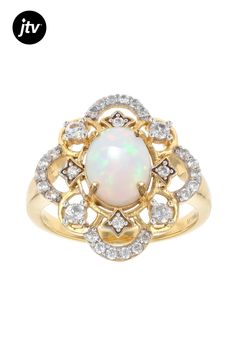 9x7mm Oval Ethiopian Opal With 0.59ctw Round White Zircon 18k Yellow Gold Over Sterling Silver Ring. Measures Approximately 0.72"L x 0.78"W. Not Sizeable. Accent Stones Primarily Zircon. Ethiopian Opal, Sterling Silver Ring, Silver Ring, Sterling Silver Rings, 18k Gold, Opal, Silver Rings, Yellow Gold, Sterling Silver