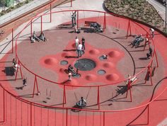 an aerial view of people playing in a playground