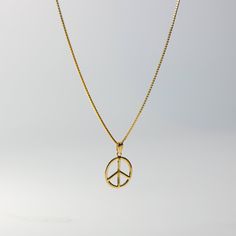 *The pendant COMES WITH the chain if you select one of our chain options *5% OFF TOTAL PRICE, when you purchase the chain and pendant combo (The price shown is after the discount) Invite good vibes and share it to people wherever you go. For the longest time, this symbol has been a sign of peace. This 14K solid gold peace sign pendant is the perfect handmade jewelry to wear if you want to invite happiness, love, and harmony into your day. The handcrafted solid gold pendant is a product of genera Symbolic Round Peace Sign Jewelry, Peace Sign Jewelry For Gifts, Symbolic Peace Sign Jewelry For Gift, Gold Peace Sign Jewelry Gift, Gold Jewelry With Peace Sign For Gift, Spiritual Peace Sign Necklace As A Gift, Hippie Style Gold Nickel-free Jewelry, Hippie Style Nickel-free Gold Jewelry, Hippie Nickel-free Gold Jewelry