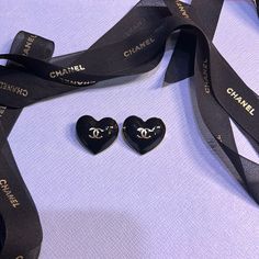 Chanel Holiday Heart Charms In Black N Gold Metal. Pair Of Charms . Authentic . Has A Gap In The Back To Be Used In Accessory On Necklace Or Brooch . Comes With Chanel Packaging Ribbon As Well. New Without Tag. Never Used . Chanel Packaging, Chanel Charms, Jewelry Chanel, Chanel Accessories, Chanel Jewelry, Chanel Black, Chanel Shoes, Ribbon Colors, Black Enamel