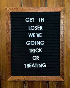 a sign that says get in closer we're going trick or treating on the door