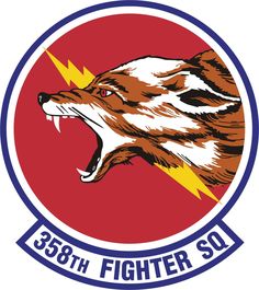 the logo for the 33rd fighter squadron, with an angry bear's head and lightning bolt