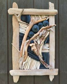 a piece of art made out of sticks and driftwood