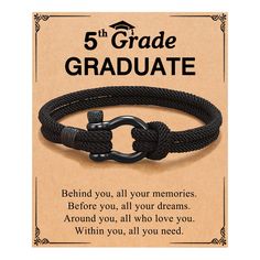 a black rope bracelet with the words 5 th grade graduate on it and an anchor clasp