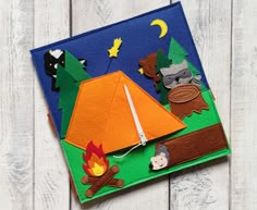 this is an image of a camp scene made out of felt