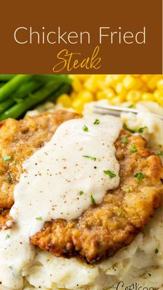 chicken fried steak with gravy on top and mashed potatoes in the background