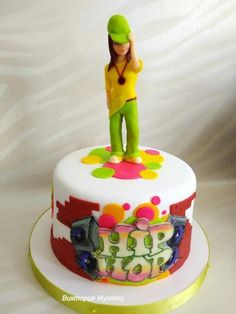 a cake with a figure on top of it