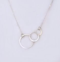 Infinity Necklace Linked Circle Necklace by GlassPalaceArts Modern Sterling Silver Infinity Jewelry, Nickel-free Full Circle Elegant Jewelry, Fine Jewelry Sterling Silver Infinity Jewelry, Fine Jewelry Sterling Silver Infinity, Sterling Silver Infinity Fine Jewelry, Minimalist Nickel-free Infinity Jewelry, Rose Gold Sterling Silver Circle Jewelry, Circular Jewelry For Mother's Day, Hypoallergenic Open Circle Anniversary Jewelry